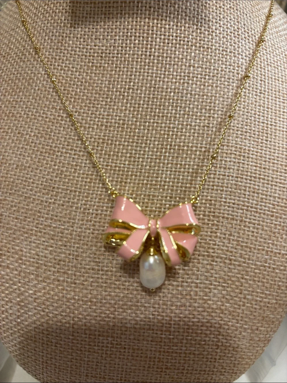 Kendra Scott Gold Necklace with Pink Enamel Bow and Pearl Drop
